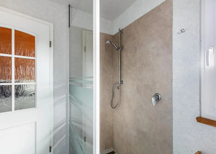 Сasa de vacaciones Holzhaus Am Waldrand Niederfinow